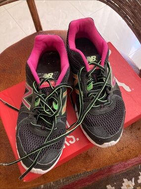 New Balance Black Athletic Sneakers with Pink Lining and Green Accents
